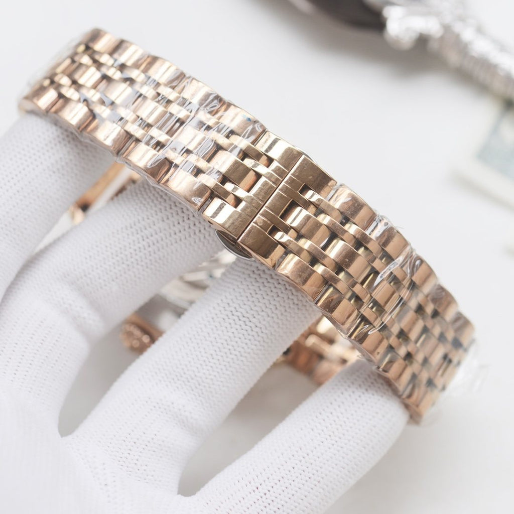 Patek Philippe Rose Gold Green Dial Bracelet Watch — detail