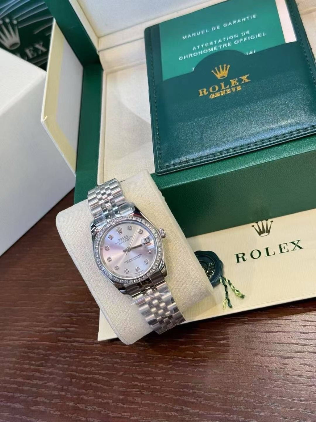 Rolex Pale Iridescent Dial Metal Bracelet Watch — front