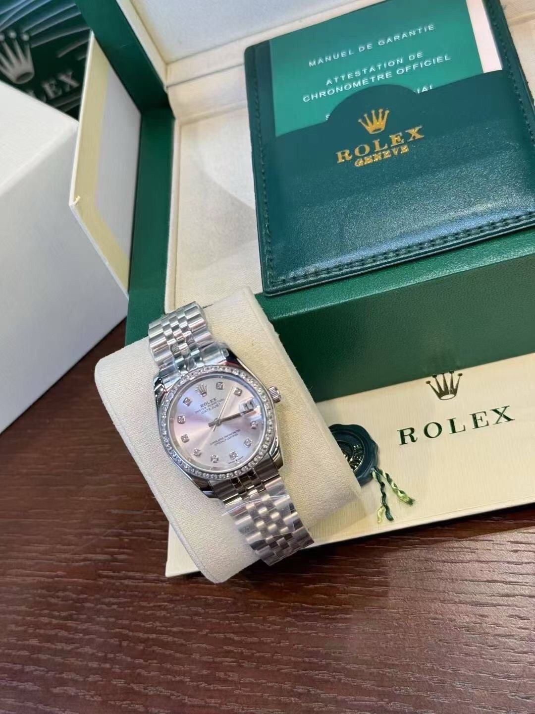 Rolex Pale Iridescent Dial Metal Bracelet Watch — front
