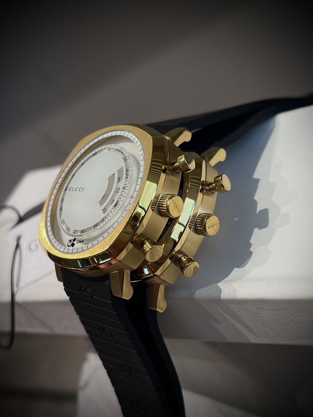 Gucci Gold Black White Dial Strap Watch — side