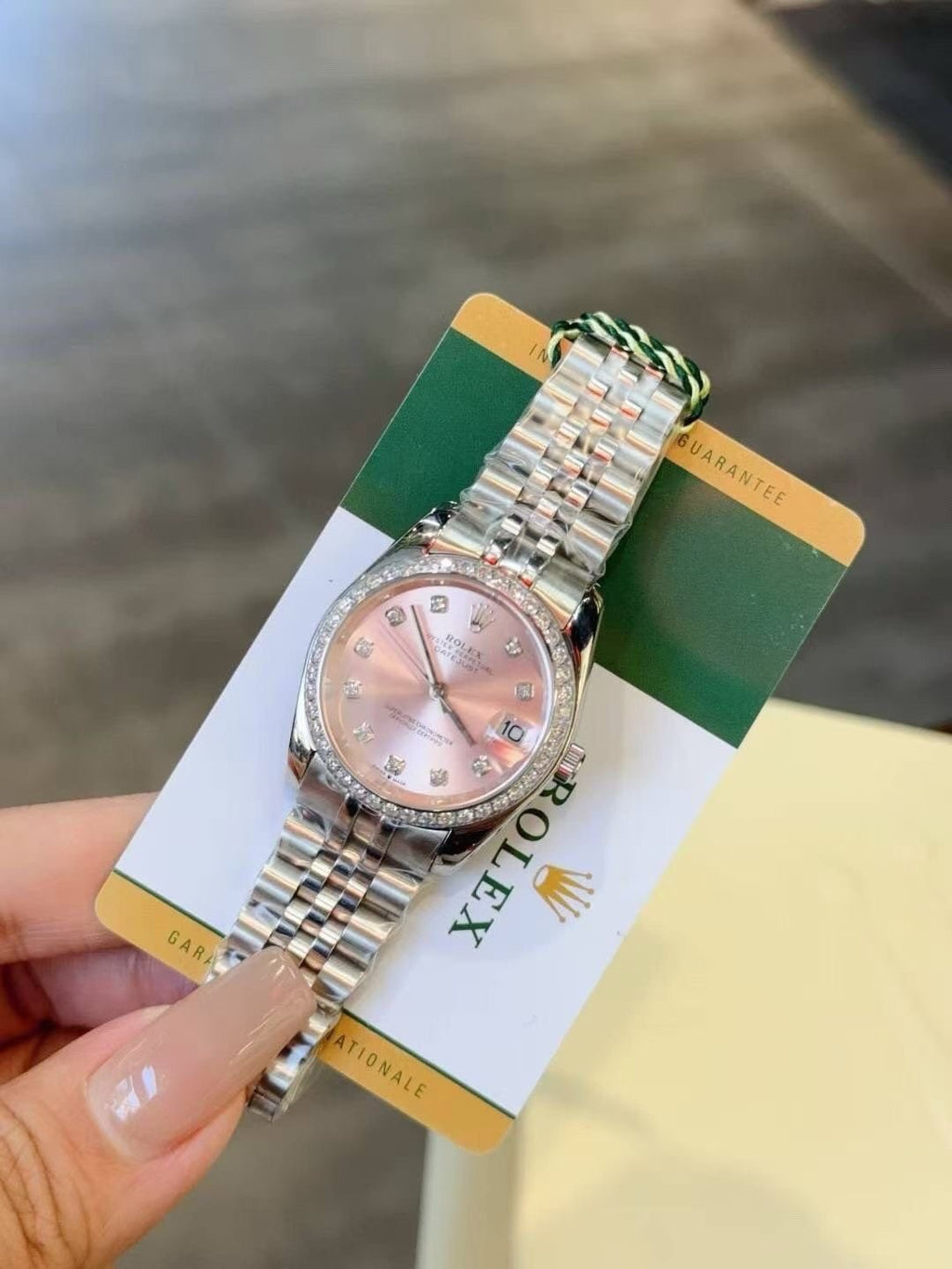 Rolex Pink Dial Metal Bracelet Watch — front