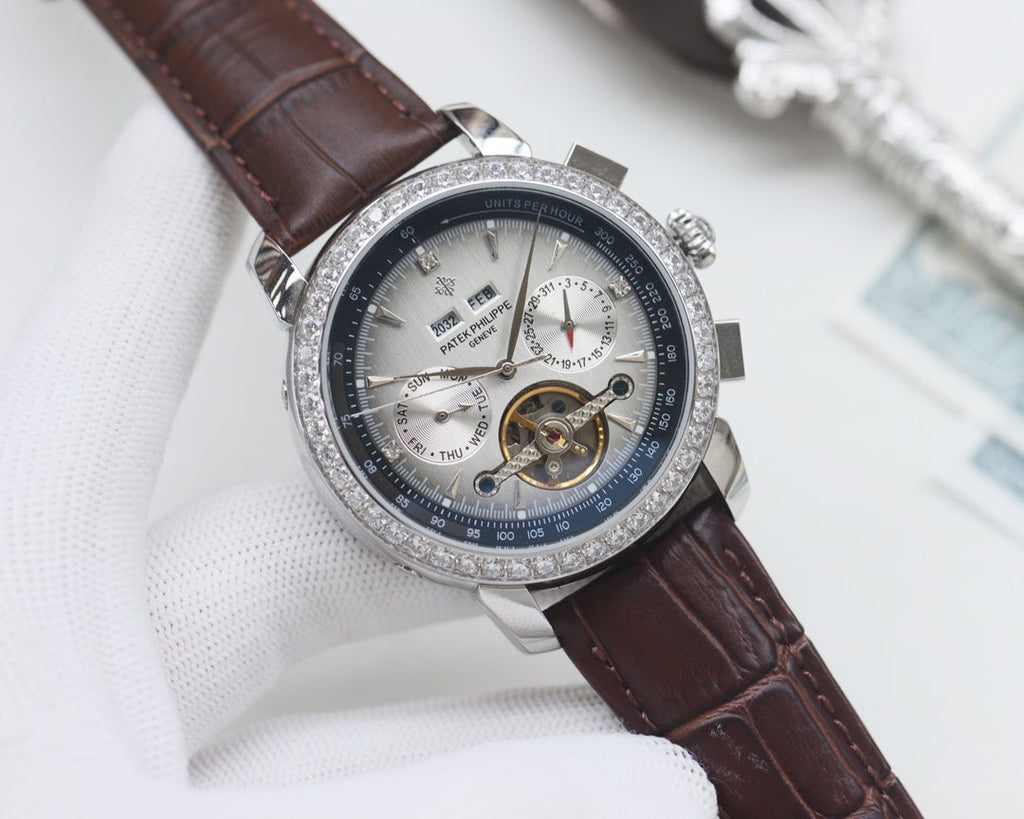 Patek Philippe Gold Silver Blue Dial Strap Watch — hero