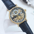Patek Philippe Gold Black Strap Watch — hero