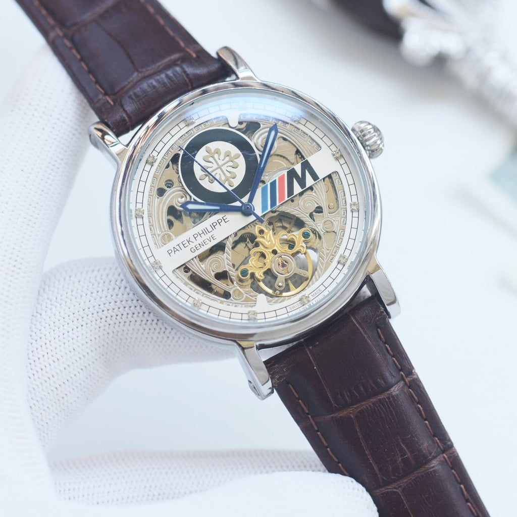 Patek Philippe Silver Brown Strap Watch — front