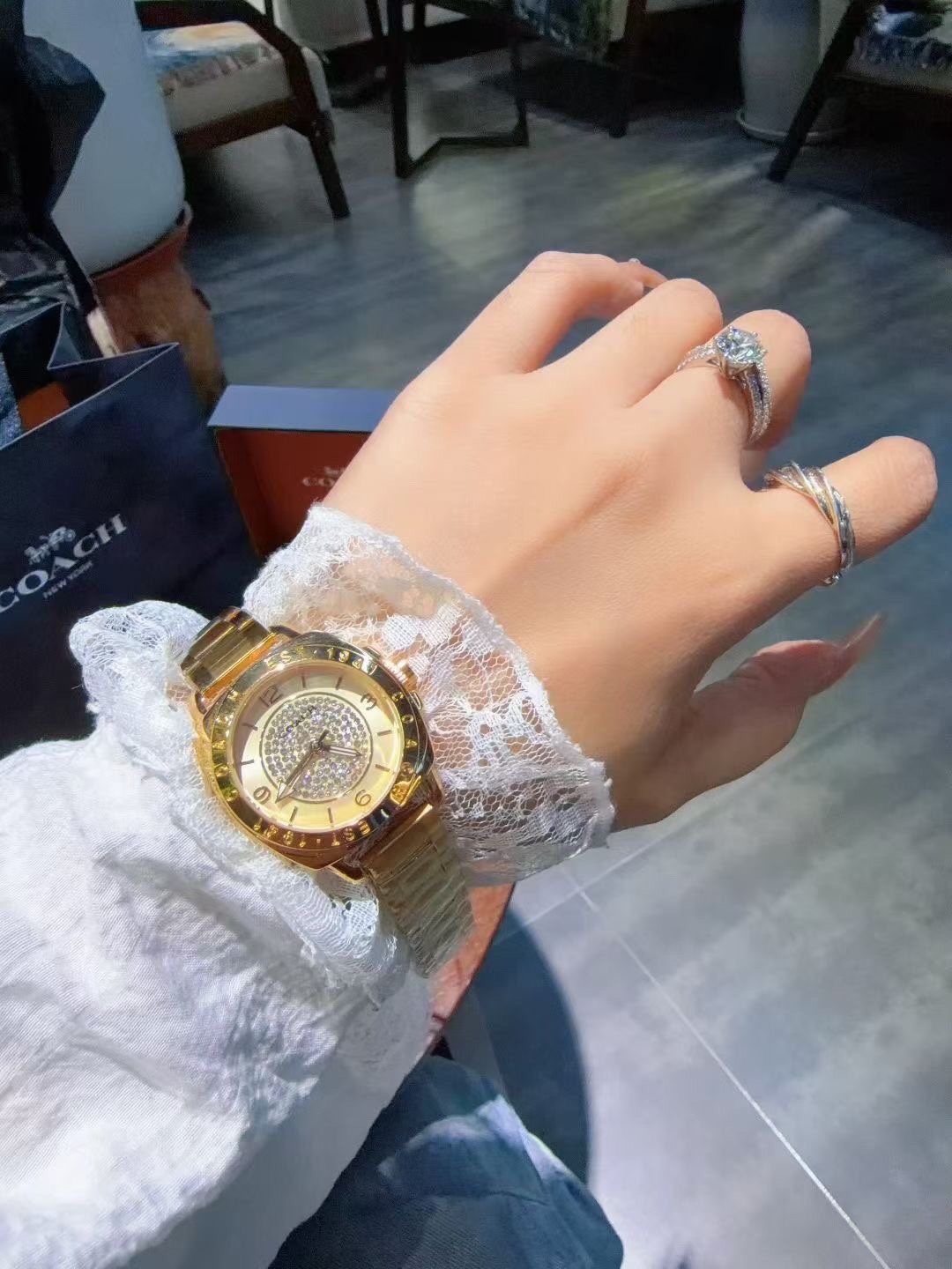 Coach Gold-Tone Crystal Bezel Watch — model