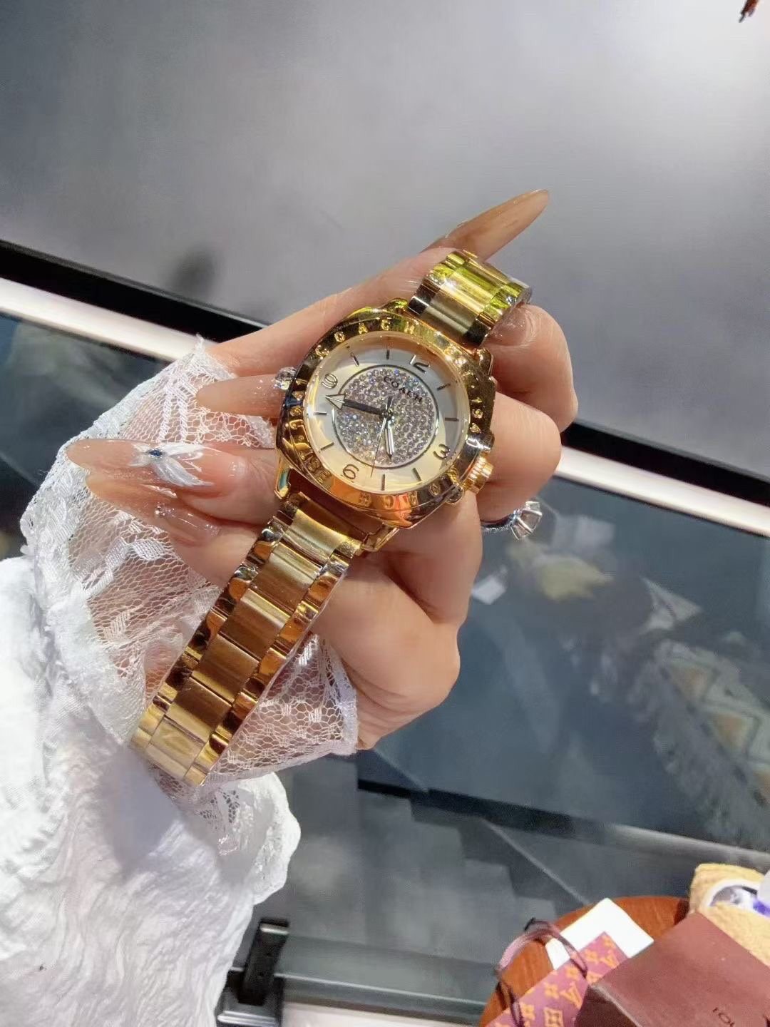 Coach Gold-Tone Crystal Bezel Watch — front