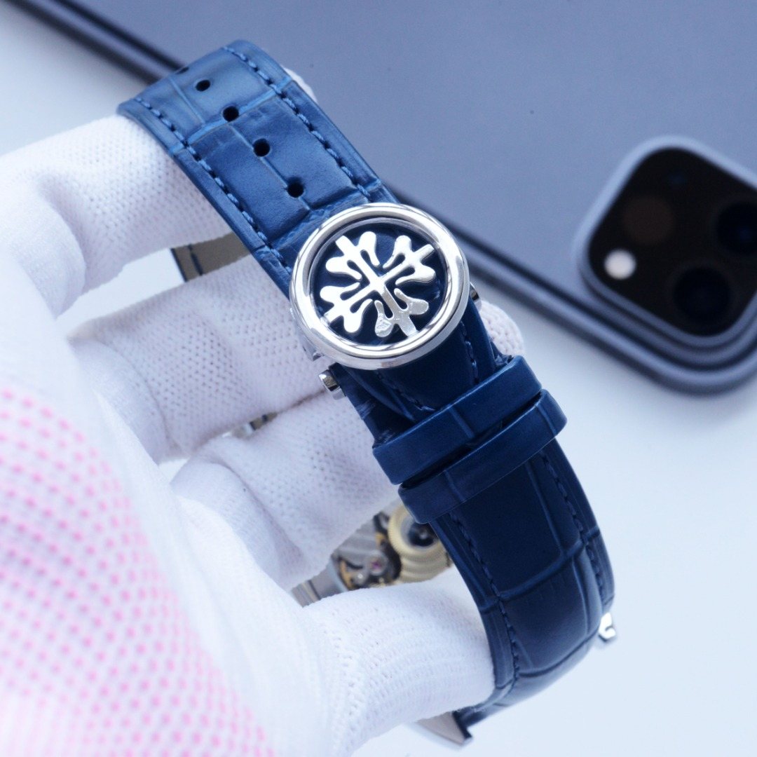 Patek Philippe Silver Blue Dial Strap Watch — detail