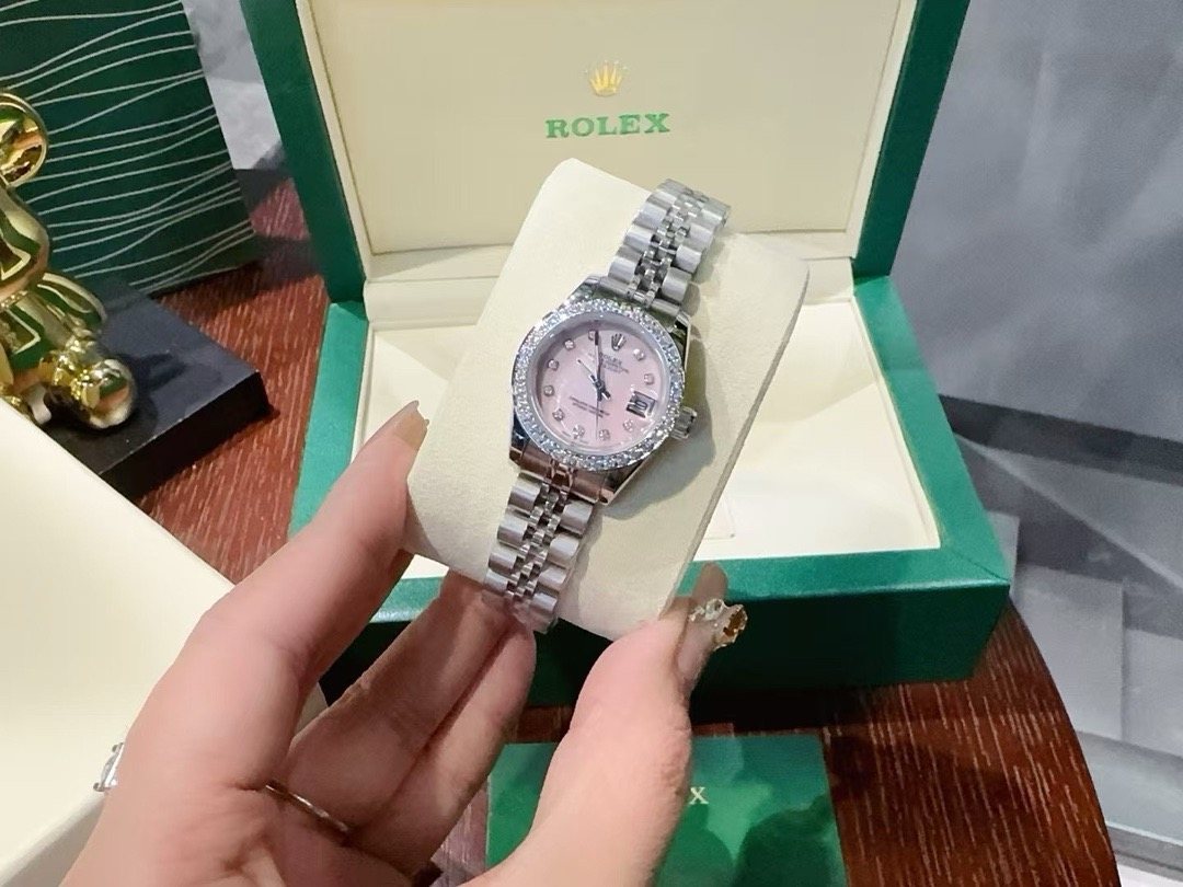 Rolex Pink Dial Watch — front