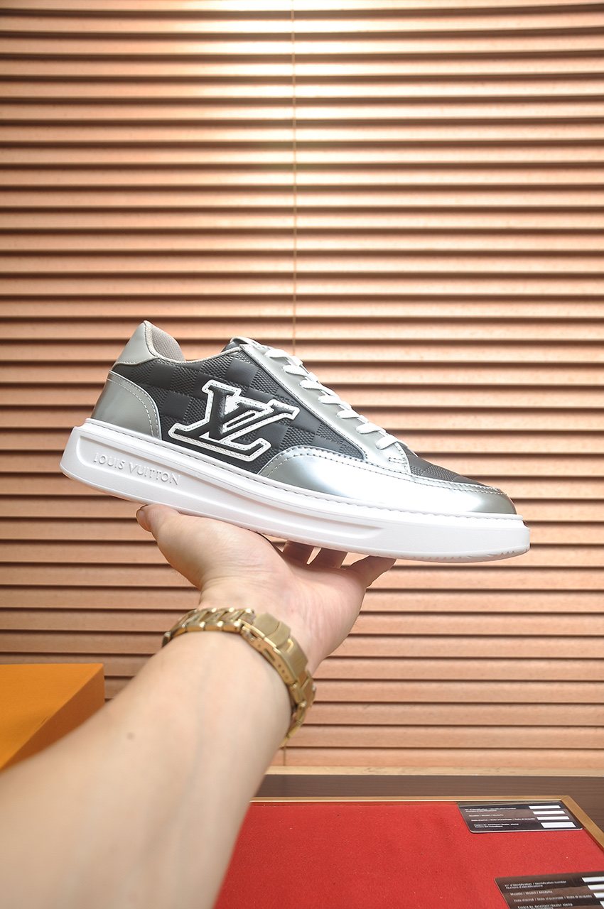Louis Vuitton Paneled Low-Top Sneakers — model
