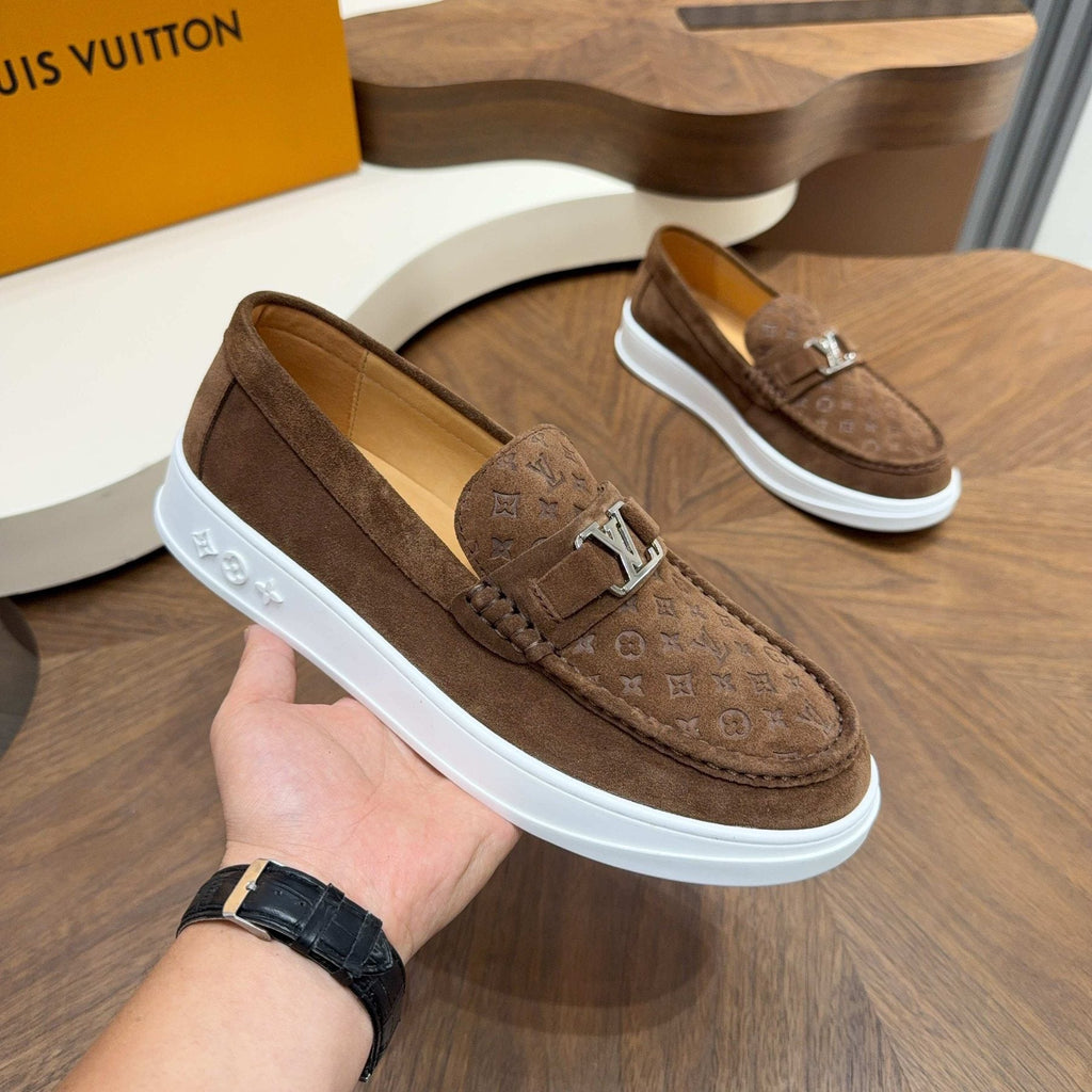Louis Vuitton Embossed Slip-On Sneakers — model