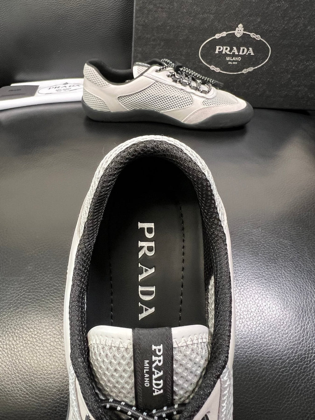 Prada White, Gray & Black Low-Top Sneakers — detail