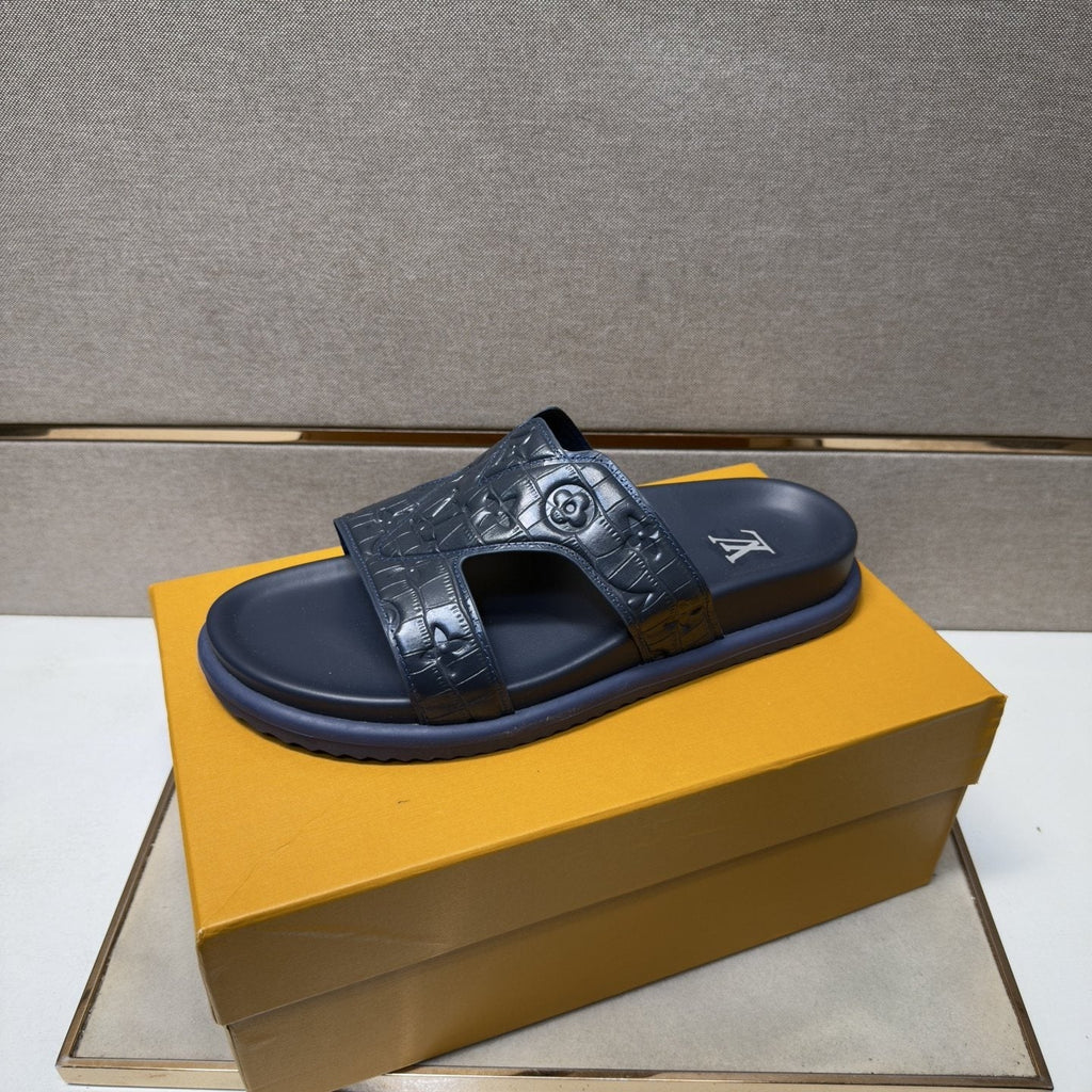 Louis Vuitton Textured Monogram Slide Sandals — front