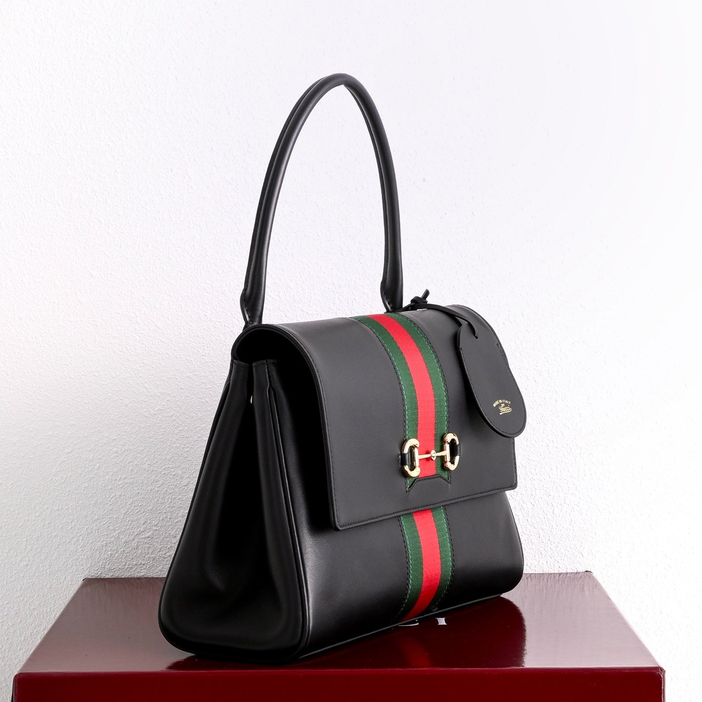 Gucci GG Paparazzo Medium Top Handle Bag