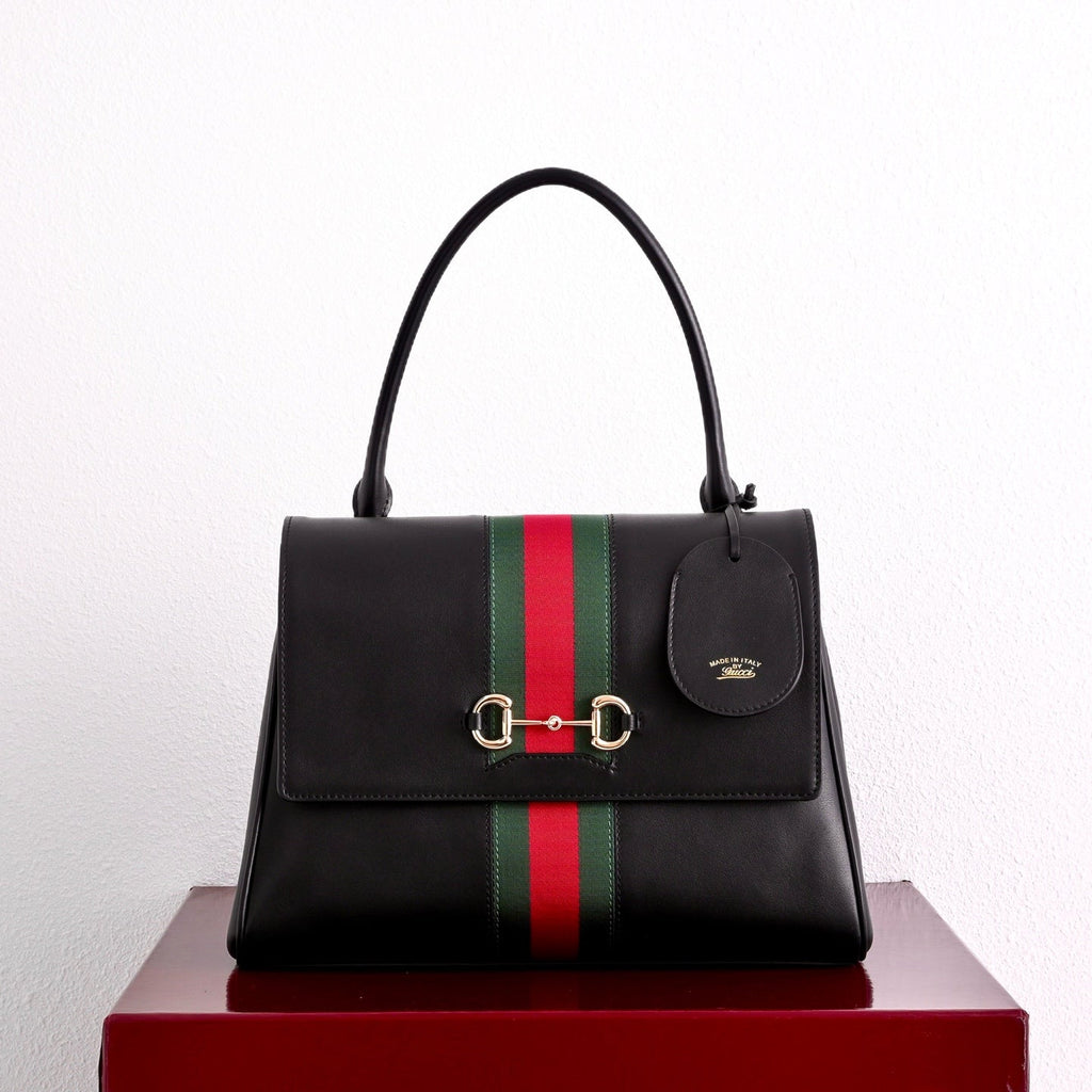Gucci GG Paparazzo Medium Top Handle Bag