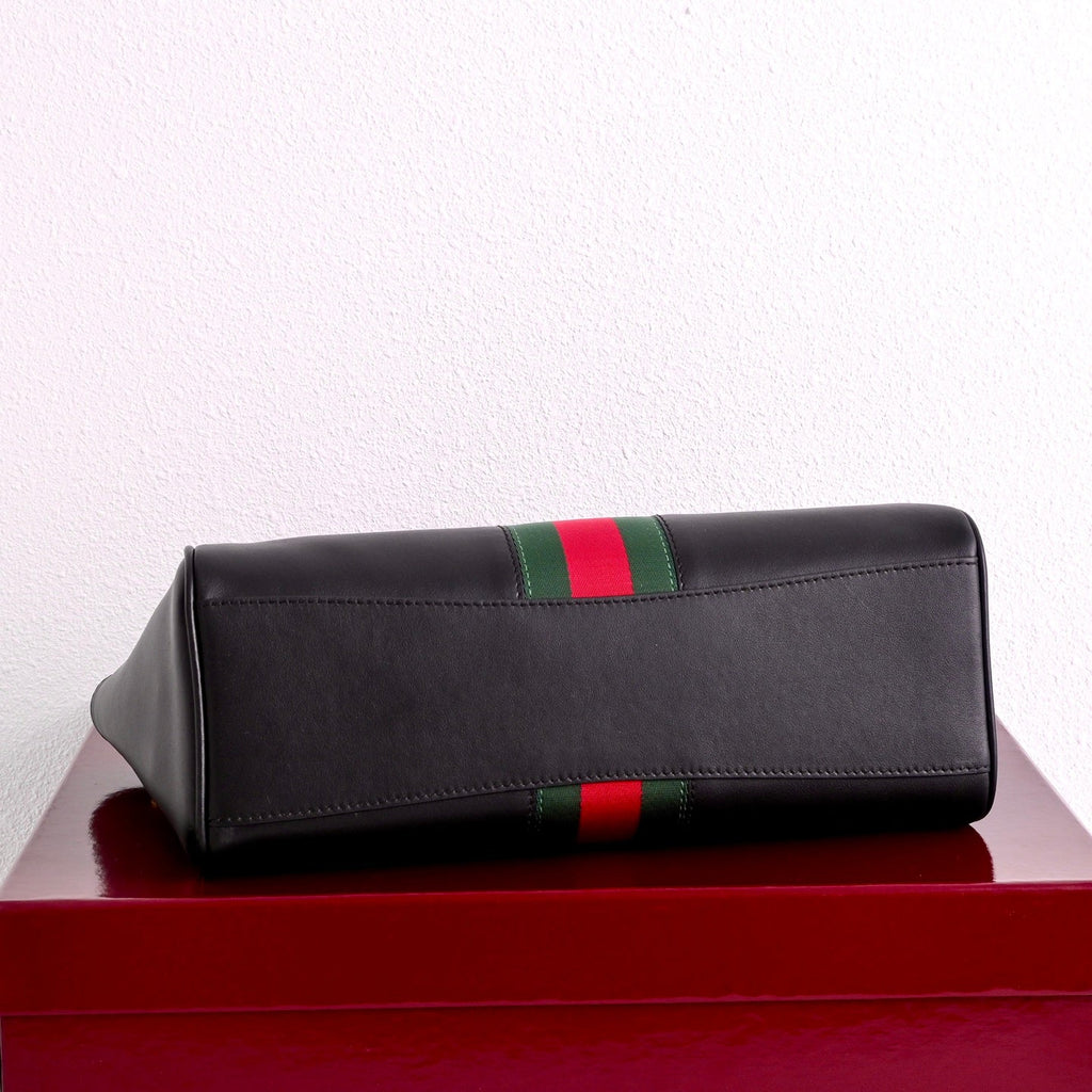Gucci GG Paparazzo Medium Top Handle Bag